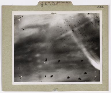 Photograph of a Japanese Bomber Going into a Dive Upon Landing Craft Off Mindoro Island