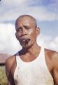 Guam, portrait of man smoking cigar