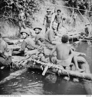 KALIKODOBU, NEW GUINEA. 1942-10. THE PARTY OF THE 2/14TH INFANTRY BATTALION ARRIVING AT THE UNITED STATES BASE CAMP. THESE MEN WERE CUT OFF FROM THE MAIN BODY OF TROOPS DURING THE WITHDRAWAL ACROSS ..