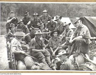 PORT MORESBY, PAPUA, NEW GUINEA. 1944-01-05. TROOPS OF THE 58/59TH AUSTRALIAN INFANTRY BATTALION, 15TH AUSTRALIAN INFANTRY BRIGADE, EMBUSSED, AND READY TO MOVE OFF FOR THE AIRSTRIP WHEN ..