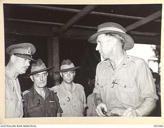 LAE AREA, NEW GUINEA, 1945-06-30. DURING HIS TOUR OF INSPECTION OF AUSTRALIAN TROOPS IN THE LAE AREA, HIS ROYAL HIGHNESS, THE DUKE OF GLOUCESTER, GOVERNOR-GENERAL OF AUSTRALIA (1) VISITED CORPS OF ..