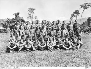 Torokina, Bougainville. 1945-10-12. Group portrait of the members of B Troop, 4th Battery, 2nd Field Regiment. Left to right, back row: VX82242 Sergeant (Sgt) E. Adderley of Glenroy, Vic; NX147552 ..