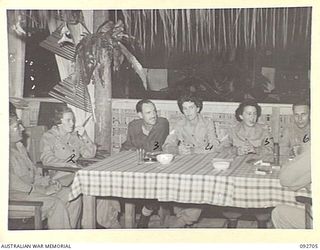 LAE AREA, NEW GUINEA. 1945-06-02. MEMBERS OF THE MESS AND AUSTRALIAN WOMEN'S ARMY SERVICE GUESTS WHO ATTENDED A DANCE AT THE SERGEANTS' MESS, HEADQUARTERS ANGAU, NORTHERN REGION. IDENTIFIED ..
