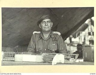 MILILAT, NEW GUINEA. 1944-07-22. VX47627 CAPTAIN G.P. HARPER, HEADQUARTERS, ROYAL AUSTRALIAN, ARTILLERY 5TH DIVISION