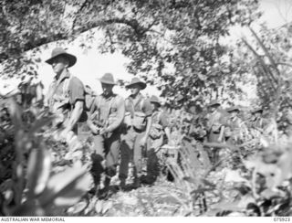 HANSA BAY, NEW GUINEA. 1944-09-07. NO. 12 PLATOON, B COMPANY, 25TH INFANTRY BATTALION MOVING THROUGH THE JUNGLE NEAR THE BOROI RIVER. IDENTIFIED PERSONNEL ARE:- N198690 PRIVATE J.R BURGESS (1); ..