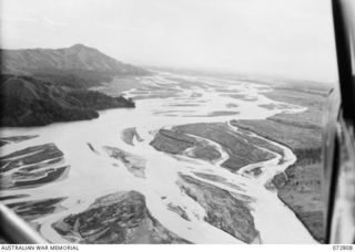 MARKHAM RIVER, NEW GUINEA. 1944-04-30. AN AERIAL VIEW OF A SECTION OF THE MARKHAM RIVER BETWEEN NADZAB AND THE RIVER'S MOUTH