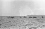 Canoe fleet on the lagoon. The outer islets can be seen in the background