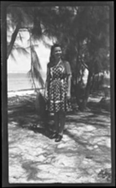 [Woman near beach]