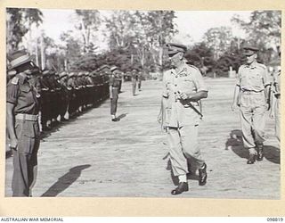 TOROKINA, BOUGAINVILLE. 1945-11-07. MAJOR GENERAL W. BRIDGEFORD, GENERAL OFFICER COMMANDING 3 DIVISION, ACCOMPANIED BY CAPTAIN V. PASSLOW, OFFICER COMMANDING A COMPANY, 67 INFANTRY BATTALION, ..