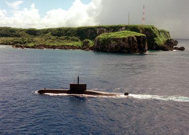 An aerial port beam view of the KOREA SOUHT REPUBLIC CHANG BOGO (Type 209) CLASS (1200) submarine CHOI MUSON (SSK 063) as it enters into Apra Harbor, Guam. The CHOI MUSON along with her crew of 33, is the first South Korean submarine to visit the Island of Guam