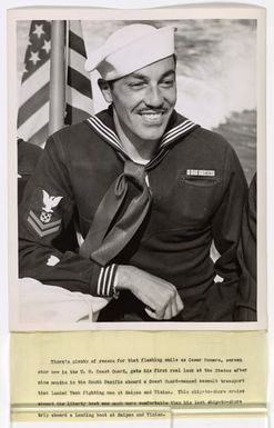 Cesar Romero, screen star now in the U. S. Coast Guard, gets his first real look at the States after nine months in the South Pacific