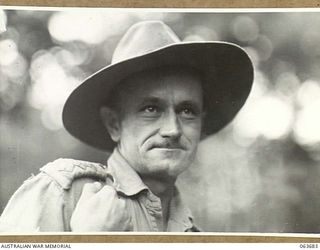 SHAGGY RIDGE AREA, NEW GUINEA. 1944-01-10. INFORMAL PORTRAIT OF QX2571 CAPTAIN D. J. MCDONALD, SECOND IN CHARGE B COMPANY, 2/9TH INFANTRY BATTALION