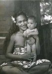 A young Polynesian woman with a girl from Bora-Bora island