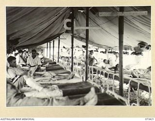 LAE, NEW GUINEA. 1944-05-24. THE INTERIOR OF THE SKIN WARD, NO.19 (MEDICAL), AT THE 2/7TH GENERAL HOSPITAL