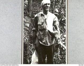 SHAGGY RIDGE, NEW GUINEA. 1943-12-27. NX59198 PRIVATE M. O'DONNELL OF THE 2/16TH AUSTRALIAN INFANTRY BATTALION, 21ST AUSTRALIAN INFANTRY BRIGADE, WHO WAS WOUNDED BY A JAPANESE GRENADE DURING THE ..