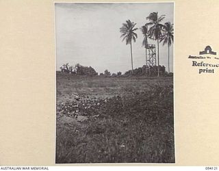 BUNA, NEW GUINEA, 1945-07-03 TO 1945-07-04. THE SITE OF THE FIRST AUSTRALIAN WAR CEMETERY WHICH WAS LATER SHIFTED TO SOPUTA