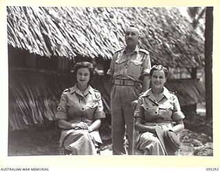 PALMALMAL PLANTATION, JACQUINOT BAY, NEW BRITAIN, 1945-08-14. OFFICERS AT 2/8 GENERAL HOSPITAL. THEY ARE LIEUTENANT S.E. DAMMAN, OFFICER COMMANDING AUSTRALIAN ARMY MEDICAL WOMEN'S SERVICE (1); ..