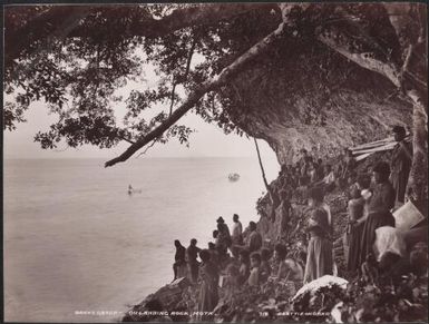 Mota people gathered on the landing rock, Banks Islands, 1906 / J.W. Beattie