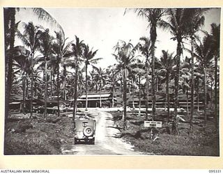 JACQUINOT BAY, NEW BRITAIN, 1945-08-20. THE ENTRANCE TO THE CAMP AREA, 12 ARMY TROOPS COMPANY ROYAL AUSTRALIAN ENGINEERS