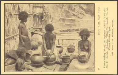 Women making pottery, an important industry in the Port Moresby District : Hanuabada Village, Port Moresby District, Central Division, Papua / photo. Capt. Frank Hurley