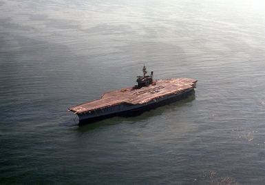 A port bow view of the USS KITTY HAWK (CV-63) as crewmen form the number "200,000" on the flight deck. AN S-3A Viking has just made the 200,000th aircraft landing aboard the aircraft carrier