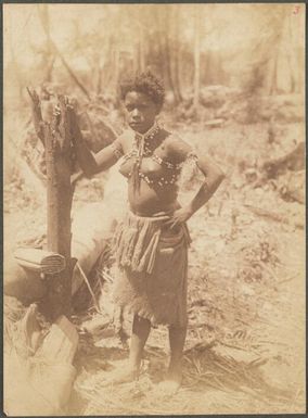 Young woman wearing a skirt made of beaten bark, Manus Island, Papua New Guinea, probably 1916