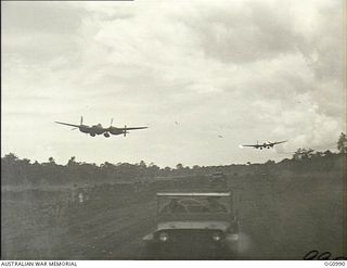 AITAPE, NORTH EAST NEW GUINEA. 1944-04-24. AMERICAN LOCKHEED LIGHTNING FIGHTER AIRCRAFT COMING IN TO LAND ON THE TADJI AIRSTRIP, FORTY EIGHT HOURS AFTER ENGINEERS OF NO. 62 WORKS WING RAAF STARTED ..