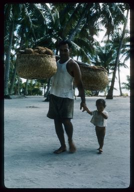 Bob Marsters and his grandson George Iotua, on Palmerston Island
