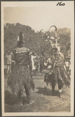 Dancers in grass skirts, Rabaul, Papua New Guinea, probably 1916