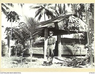 SIAR, NEW GUINEA. 1944-06-18. VX24325 BRIGADIER H.H. HAMMER, DSO, COMMANDING OFFICER, OUTSIDE HIS QUARTERS AT HEADQUARTERS, 15TH INFANTRY BRIGADE