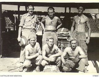 TOROKINA, BOUGAINVILLE ISLAND. 1945-01-29. PERSONNEL OF THE SOLOMON'S DETACHMENT, 12TH AIR MAINTENANCE PLATOON, 4TH BASE SUB AREA. IDENTIFIED PERSONNEL ARE:- WARRANT OFFICER II A. BRUN (1); PRIVATE ..