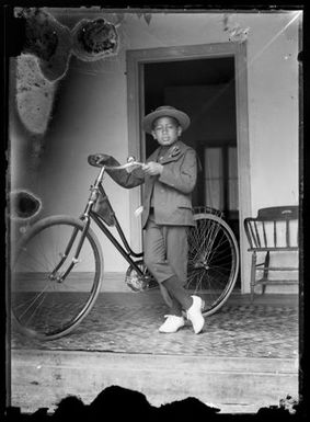 Boy with a bicycle