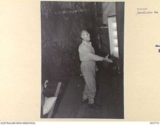 LAE AREA, NEW GUINEA. 1945-06-05. A CONCERT WAS GIVEN AT THE OPEN AIR THEATRE OF 2/7 GENERAL HOSPITAL. THE PERFORMERS WERE FROM STAFF OF 2/7 GENERAL HOSPITAL, LAE CHORAL GROUP AND THE LAE PLAY ..