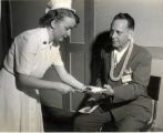 Harold Parker and Nurse, 1949