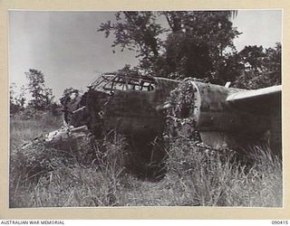 BUT, NEW GUINEA. 1945-04-02. JAPANESE "HELEN" MEDIUM BOMBER ON THE AIRSTRIP WHICH WAS RECENTLY CAPTURED BY 6 DIVISION TROOPS