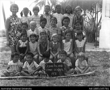 British Phosphate Company (BPC) Staff School teacher, Miss Marge Storey, with pupils