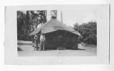 [Marines of Marine Air Group 24 Standing Outside Tent]