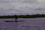 Single-log canoe, without outrigger, on Sepik area, near Angoram, [Papua New Guinea, 1969?]