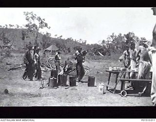 NEW GUINEA. 1943? JAPANESE PRISONERS OF WAR STAGGER INTO TENTS OF 2/9TH AUSTRALIAN GENERAL HOSPITAL (9AGH). NOTE THEIR EMACIATED CONDITION. (DONOR B. SHAW)