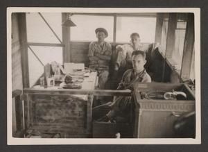 [Men in Water Point Office]