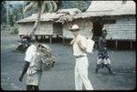 Harold Scheffler and others traveling with backpack