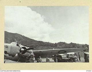 WAU, NEW GUINEA. 1944-04-26. THE LOCKHEED HUDSON BOMBER AIRCRAFT FROM NO.1 COMMUNICATION UNIT, RAAF WHICH IS USED TO TRANSPORT THE HONOURABLE E.J. WARD, MINISTER FOR EXTERNAL TERRITORIES AND ..