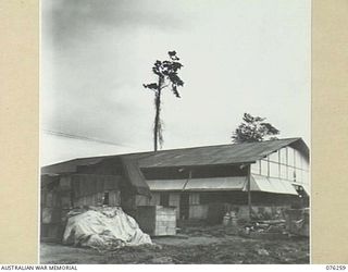 LAE, NEW GUINEA. 1944-09-27. STORES UNDER THE PROTECTION OF TARPAULINS AT THE 43RD FIELD ORDNANCE DEPOT