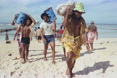 Unloading goods from boats, Tokelau