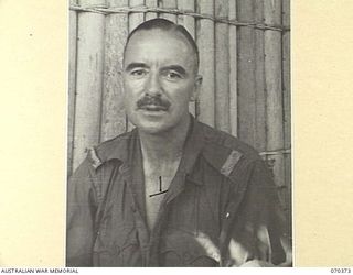 MILNE BAY, NEW GUINEA, 1944-01-11. QX30399 LANCE CORPORAL I.R. ESCOLME, DETACHMENT Z FIELD SECURITY SECTION, ATTACHED TO THE MILNE BAY BASE SUB AREA