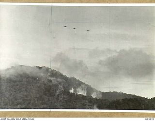 FARIA RIVER, NEW GUINEA. 1944-01-20. MITCHELL BOMBERS MOVING INTO ATTACK JAPANESE POSITIONS ACROSS MAIN CREEK