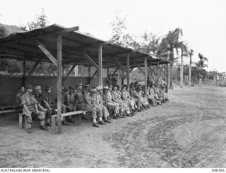 RABAUL, NEW BRITAIN. 1945-10-28. A CEREMONIAL PARADE AND MARCH PAST BY TROOPS OF 11 DIVISION WAS INSPECTED BY GENERAL SIR THOMAS A. BLAMEY, COMMANDER-IN-CHIEF, ALLIED LAND FORCES, SOUTH WEST ..