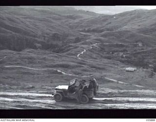 WAU AREA, NEW GUINEA. 1943-08-15. GENERAL PANORAMA OF SECTION OF THE JEEP ROAD NEAR KAISINIK