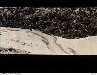 Markham Valley, New Guinea. 1944. An aerial view showing a section of the Markham River with Allied troops crossing the stream