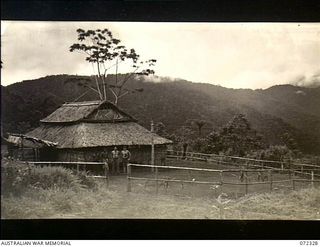 Menari, New Guinea. 1944-04-06. NX66475 Signalman C. A. Wombey and QX59067 Signalman T. N. Renton at the Brigade Hill Signal Station of the 23rd Line Section, 18th Australian Lines of Communication ..